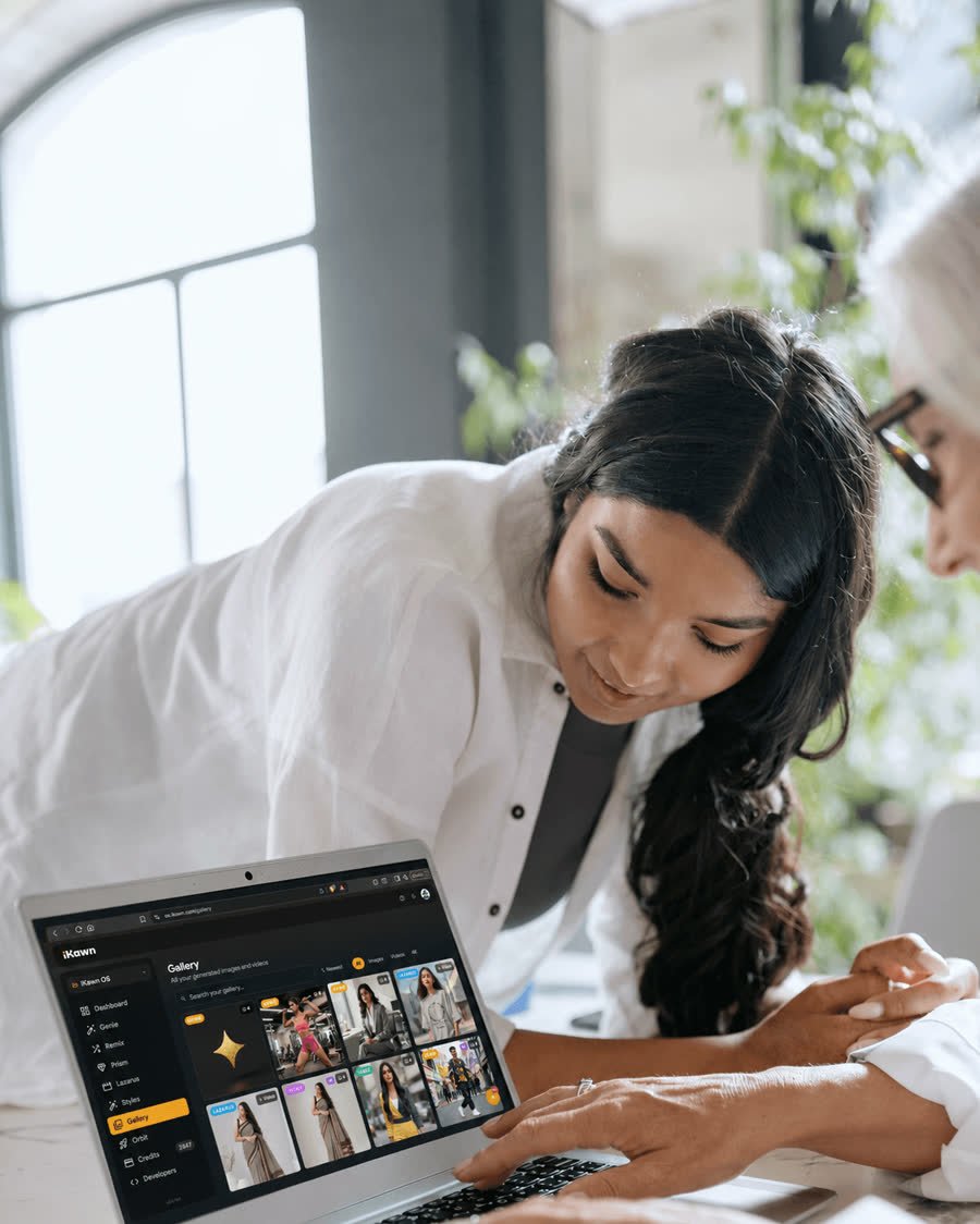 Team reviewing iKawn OS on a laptop